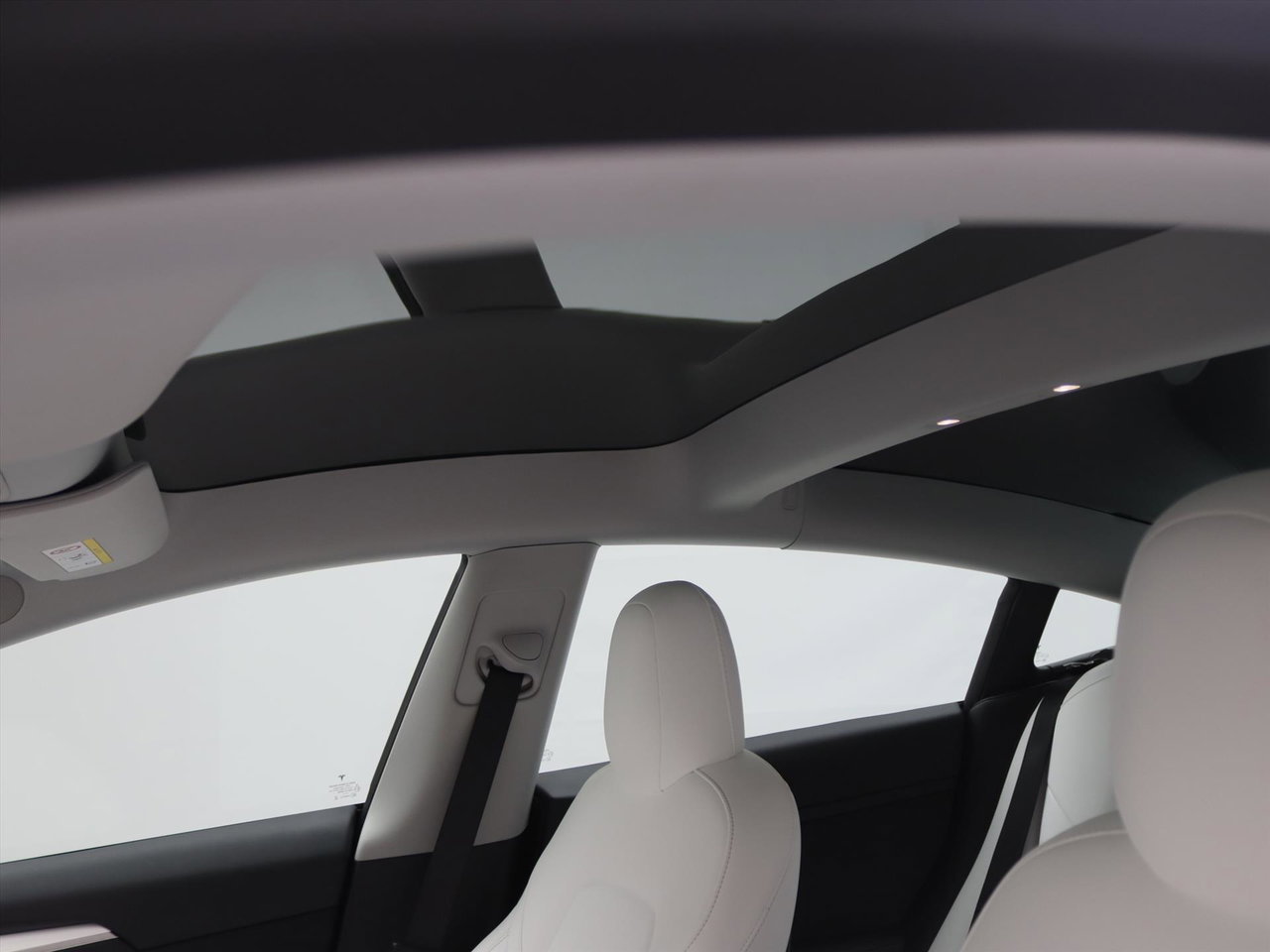 Tesla Model 3 Long-Range AWD 351pk 75 kWh FACELIFT 88,4% SoH [ WIT LEDER+WARMTEPOMP+ENHANCED AUTOPILOT+620KM WLTP+PREMIUM AUDIO ] 19